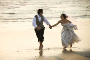 running down beach.